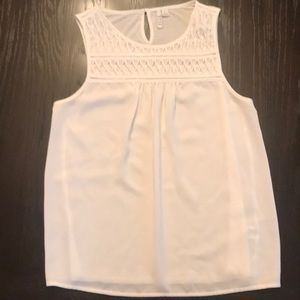 White sleeveless top